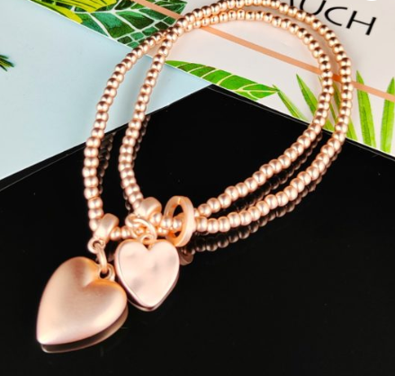 SHE DOUBLE CHAIN BRACELET WITH HEARTS 