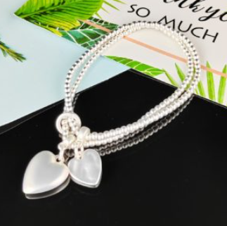 SHE DOUBLE CHAIN BRACELET WITH HEARTS 